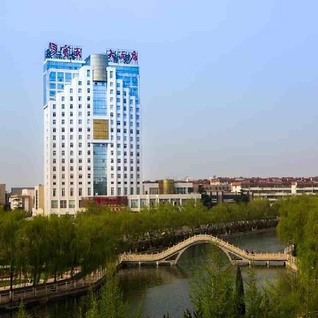 Feicheng Blossom Hotel Exterior photo