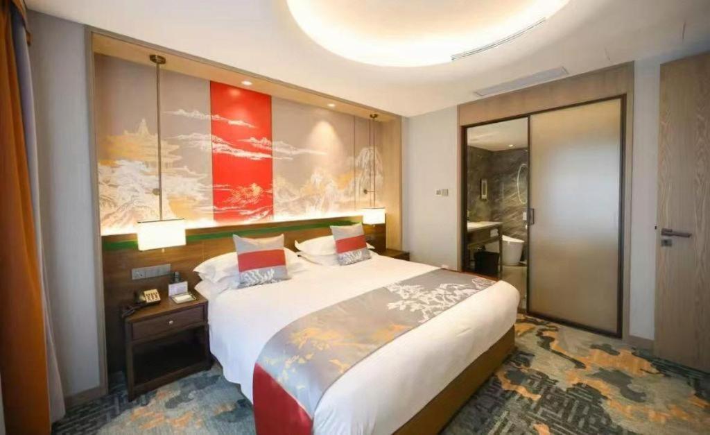 Feicheng Blossom Hotel Exterior photo