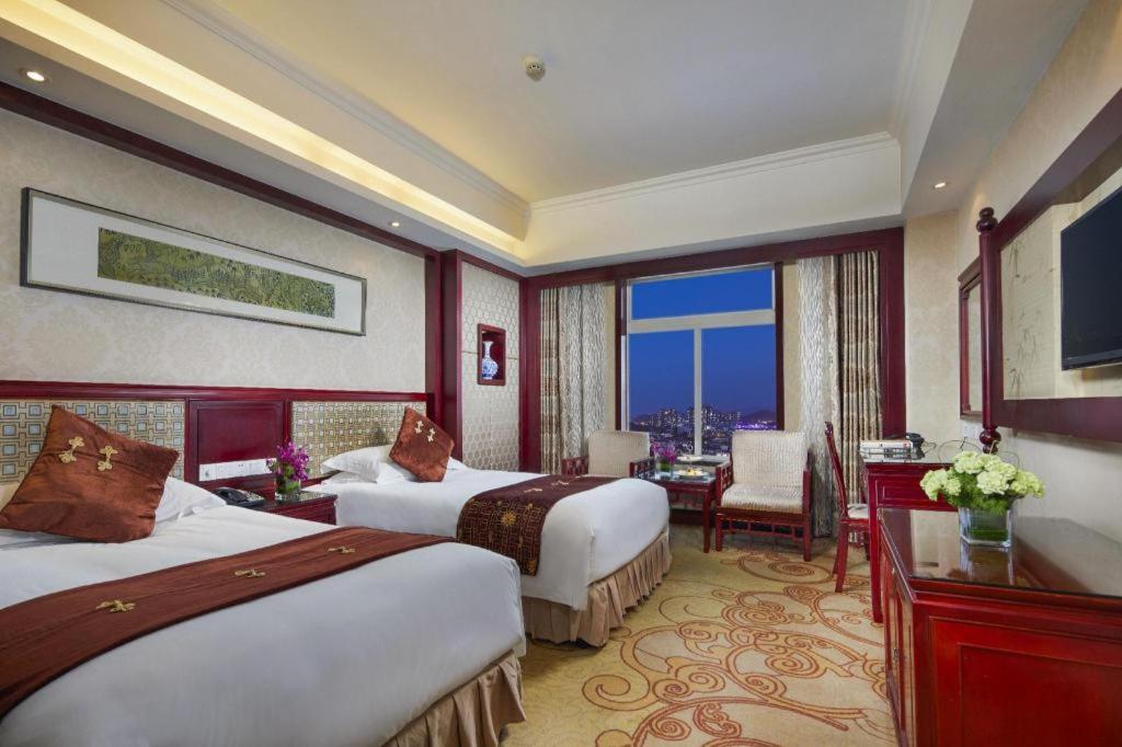 Feicheng Blossom Hotel Exterior photo